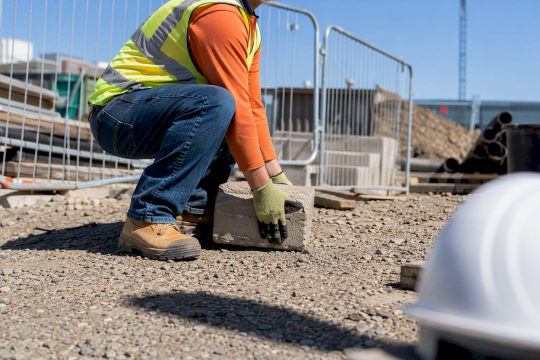 Worker lifting load using safe technique