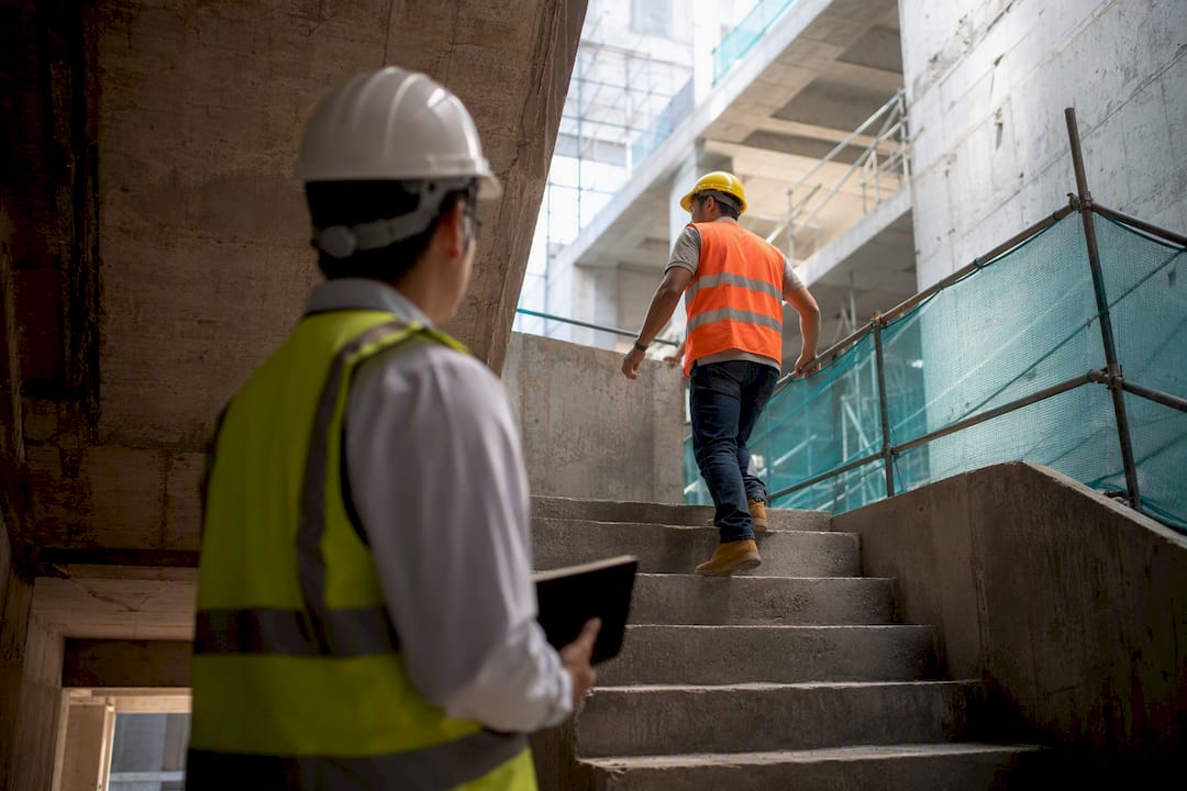 Auditor observing construction safety controls