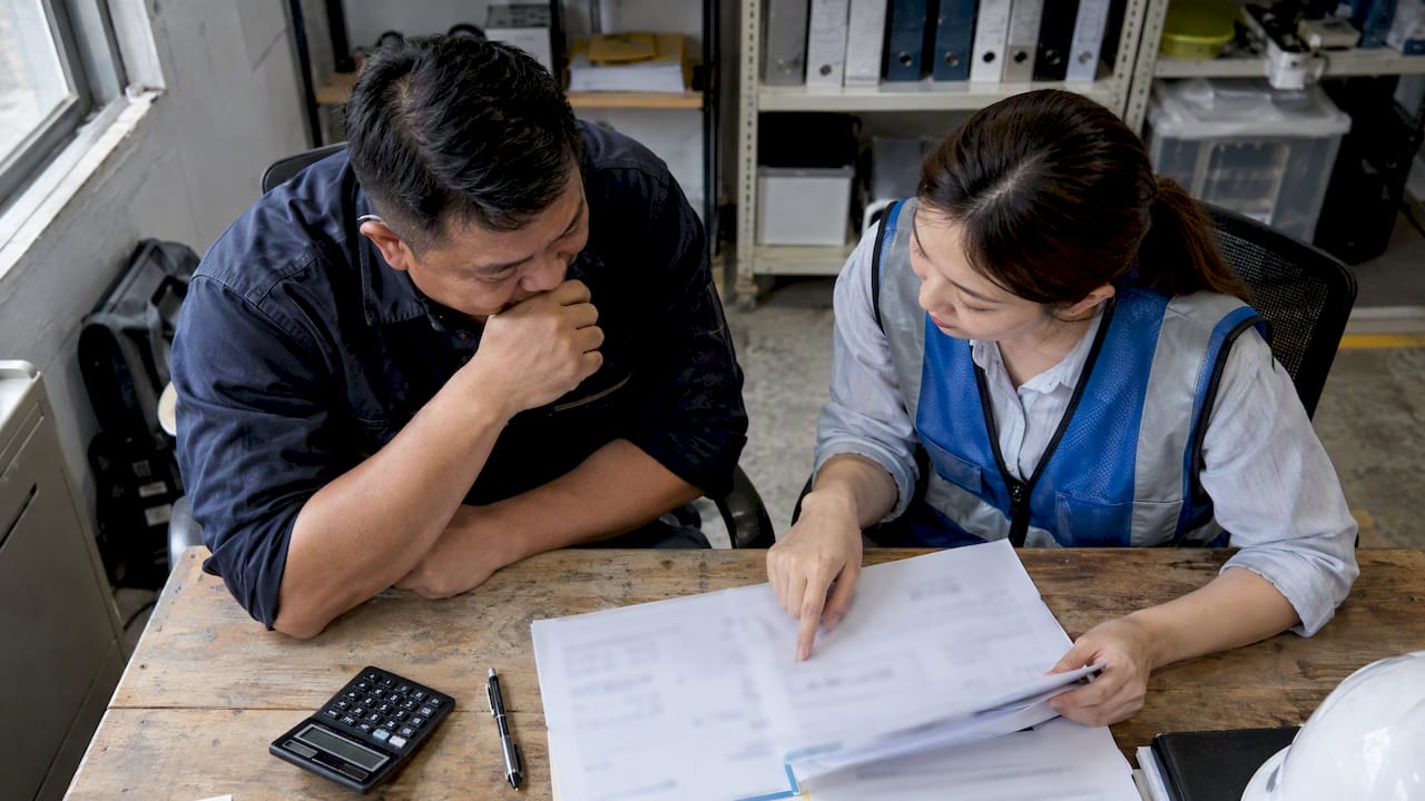 Contractor reviewing Singapore safety audit quotation